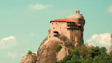 a building on a rock