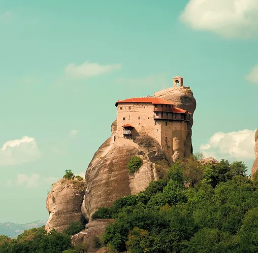 a building on a rock